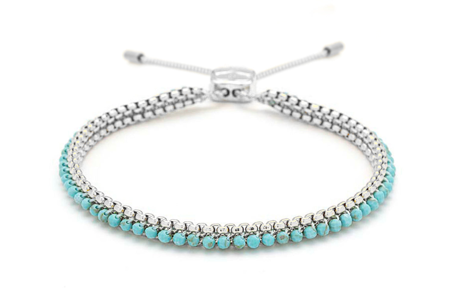 Zena Turquoise Howlite Silver Beaded Bracelet with calming turquoise gemstones woven through a silver-plated chain for a fresh, boho-luxe look.