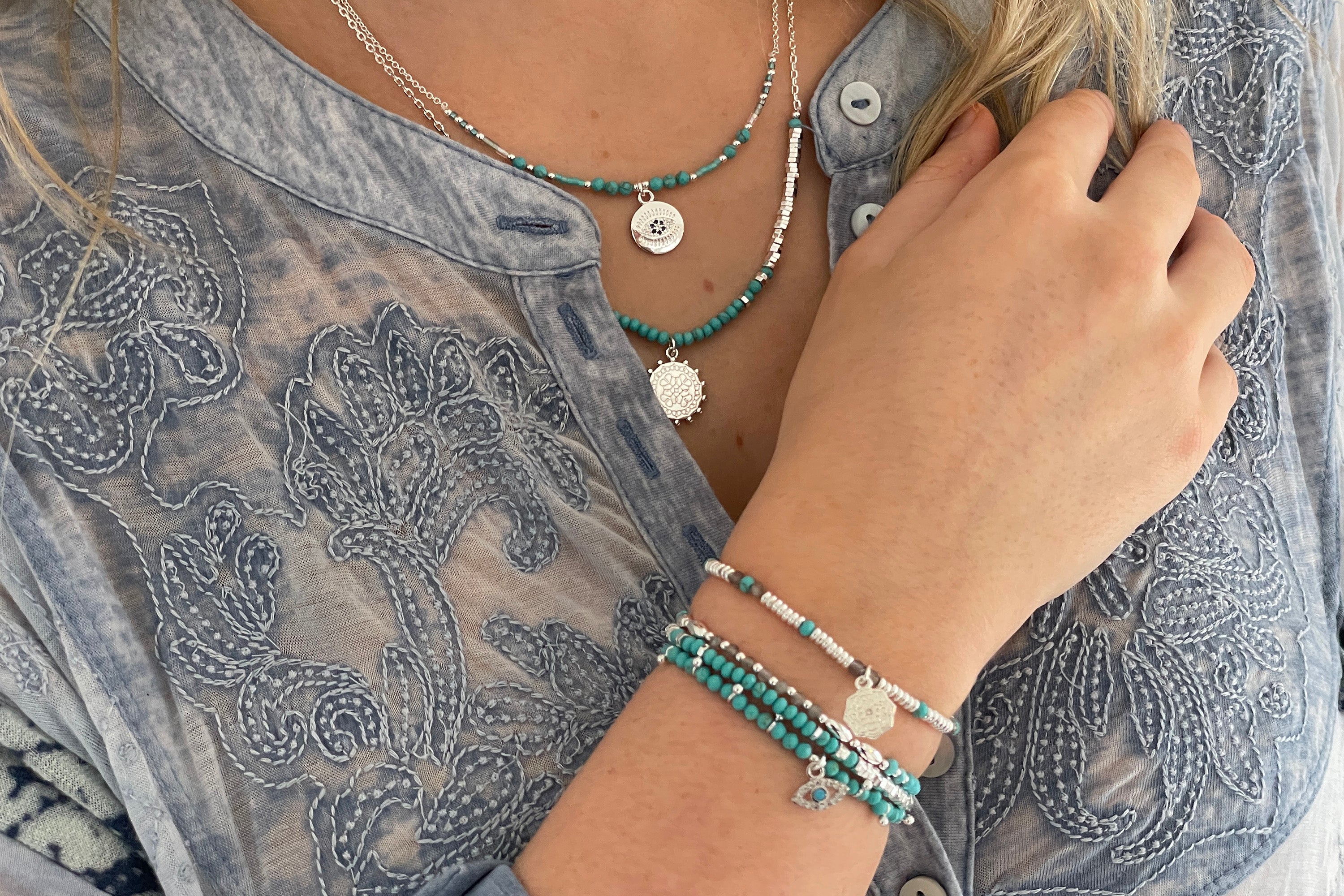 Brela Blue Evil Eye Silver Charm Bracelet - Boho Betty