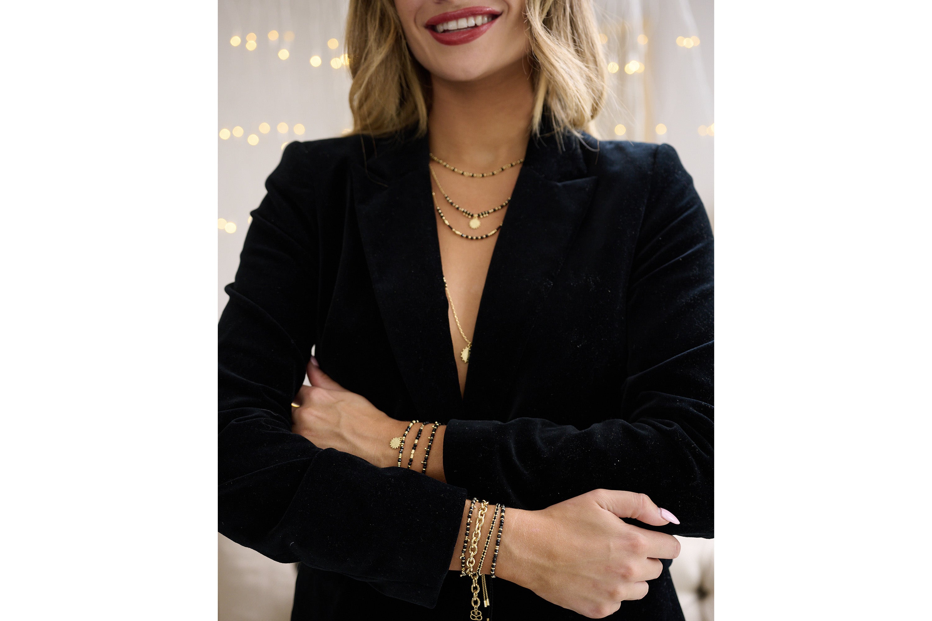 Ebony Gold Black Spinel Thread Through Bracelet and Fora Necklace layered with other black spinel and necklaces. - Boho Betty