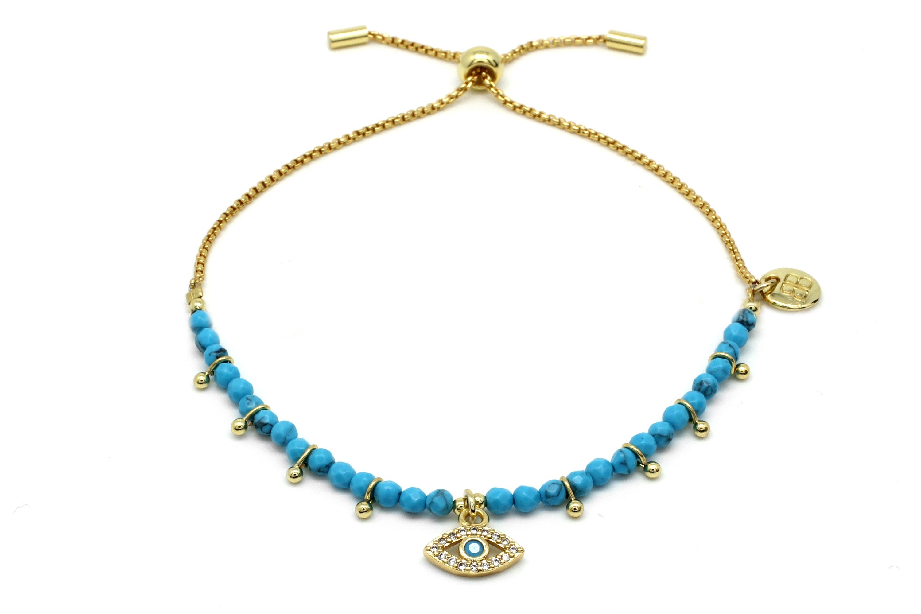 Brela Blue Evil Eye Charm Bracelet#color_gold