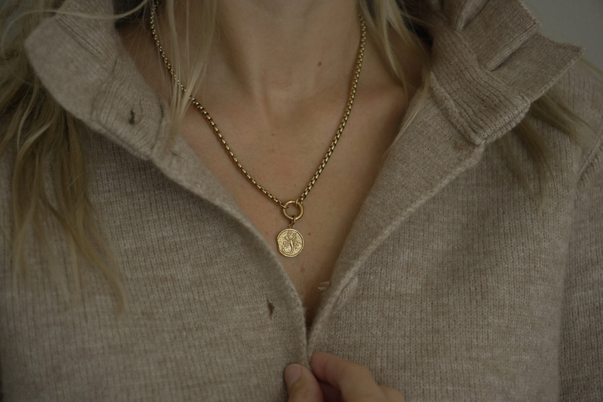 Zaya Scorpio Gold Zodiac Charm by Boho Betty – a waterproof gold Scorpio coin charm, styled on a gold chain necklace