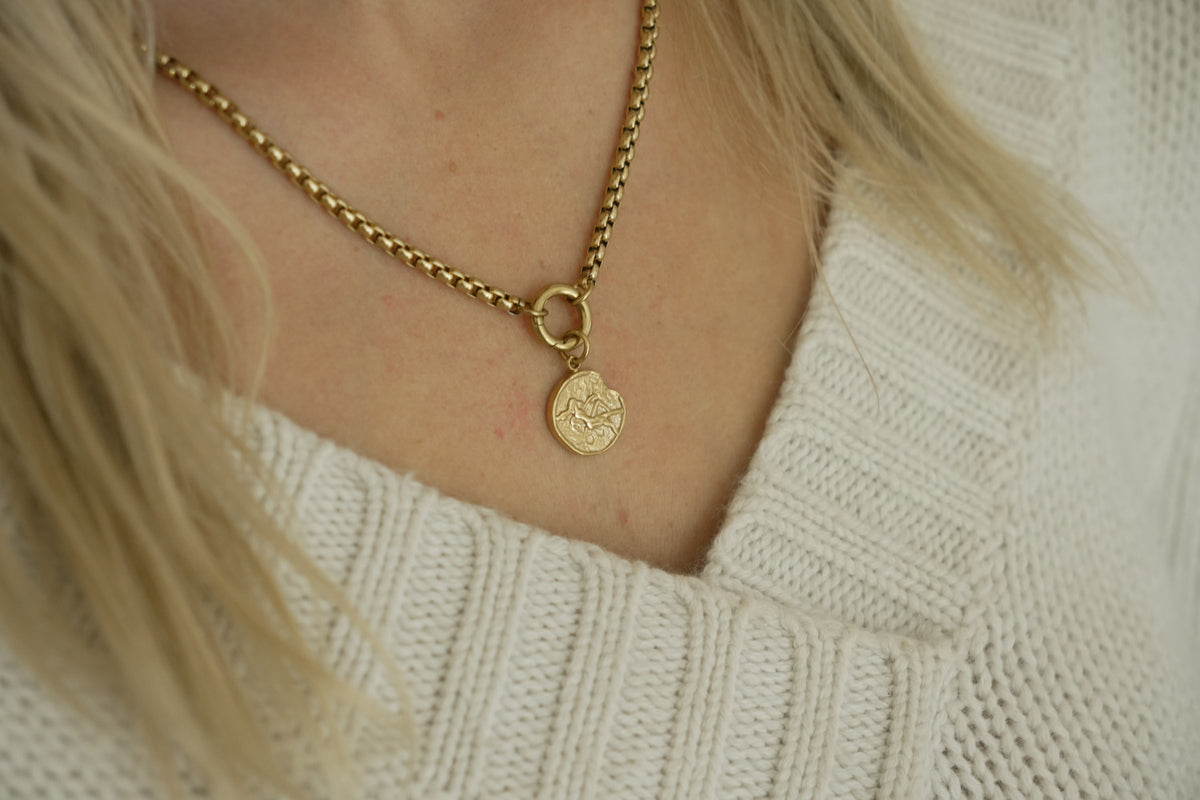 Zaya Virgo Gold Zodiac Charm by Boho Betty – a waterproof gold Virgo coin charm, styled on a gold chain necklace