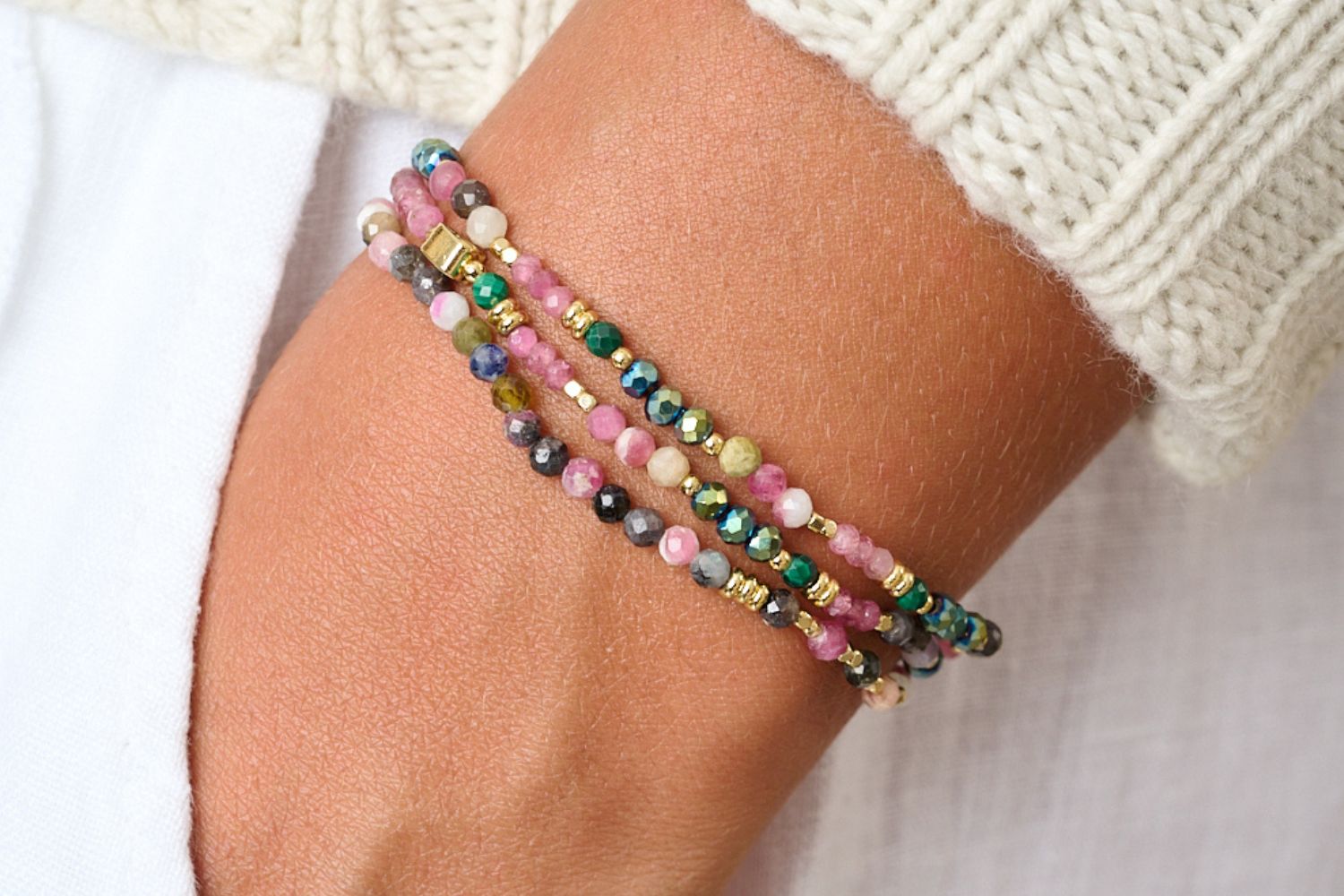 Lifestyle picture styling the Boho Betty three wrap tourmaline gemstone stretch bracelet. The perfect day to night pics and Christmas Gift for her.