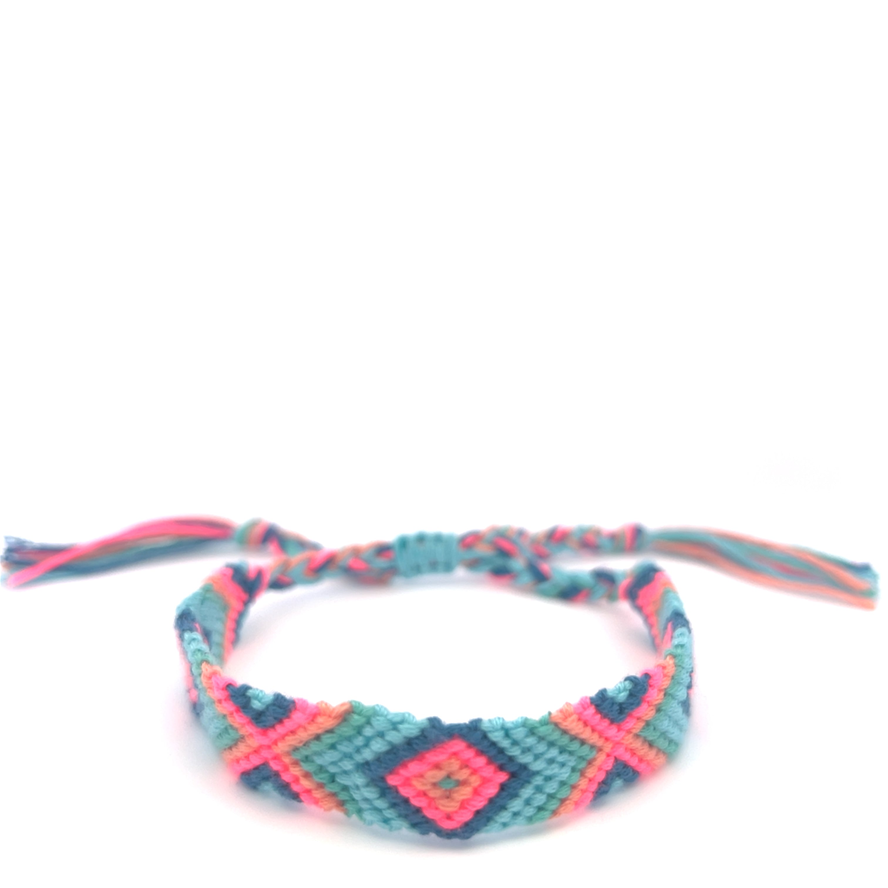 Turquoise and pink braided headband on a white background #color_blue