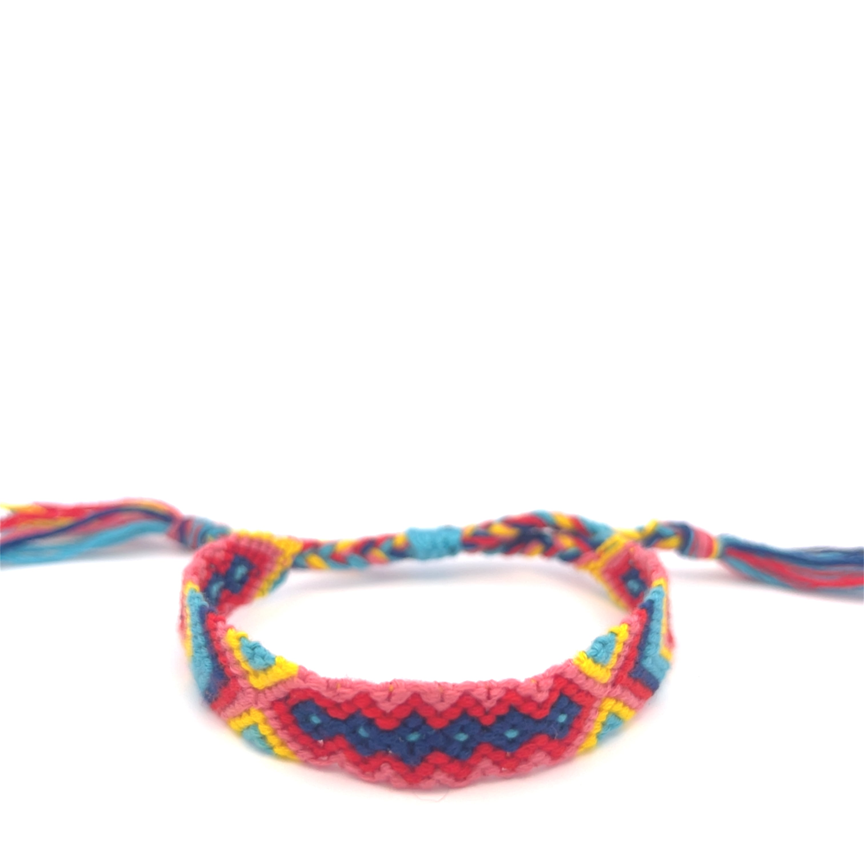 Colorful braided bracelet on a white background #color_multi
