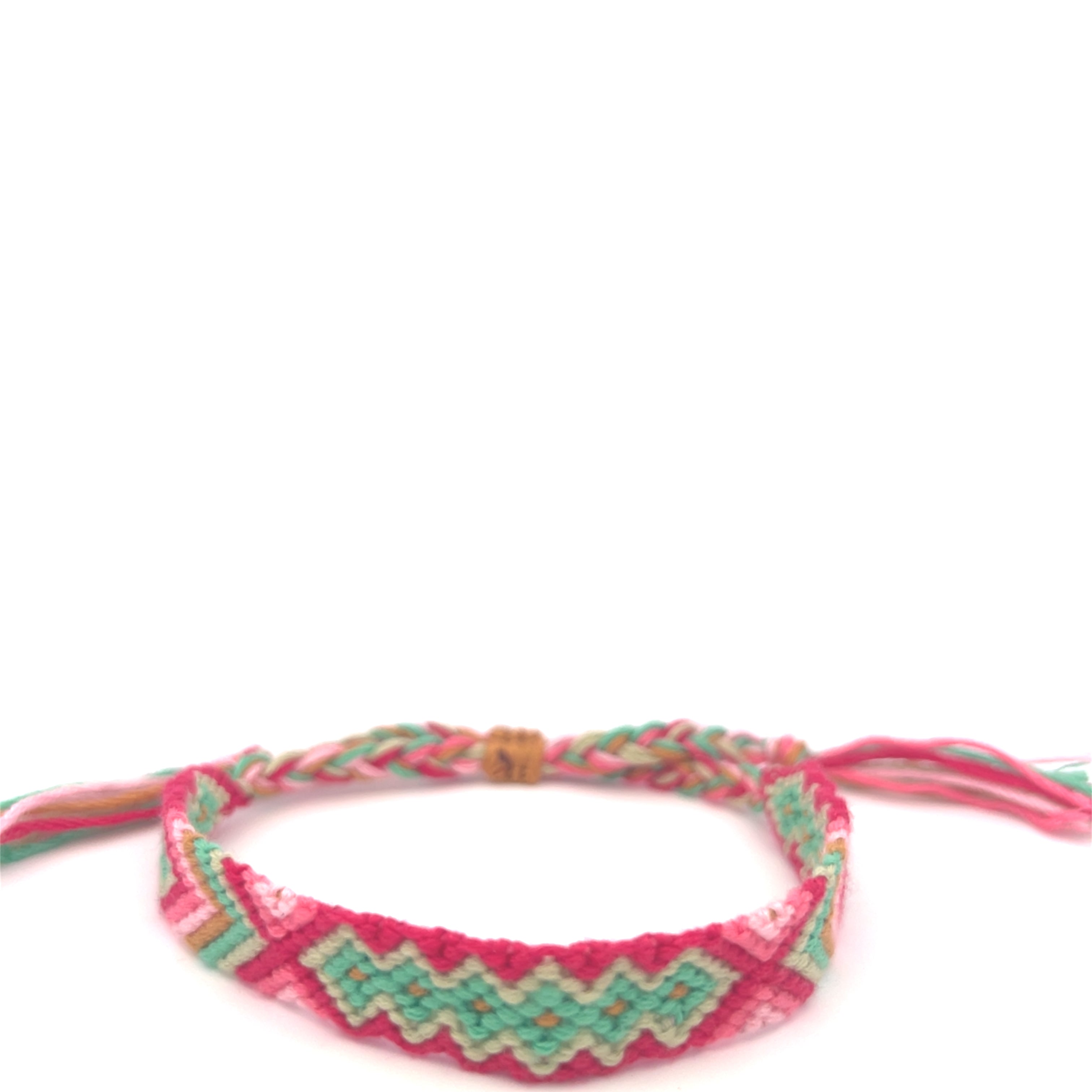 Bracelet with pink and green pattern on a white background #color_pink