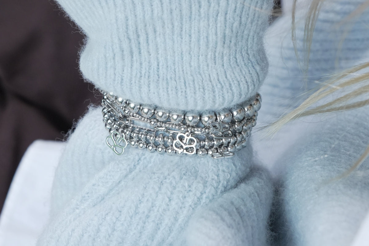Lissette silver bead bracelet by Boho Betty – styled in a stack, a stackable silver beaded stretch bracelet for everyday wear