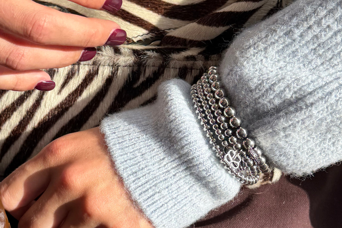 Cleo silver bead stretch bracelet by Boho Betty – styled in a stack, a stackable silver beaded stretch bracelet