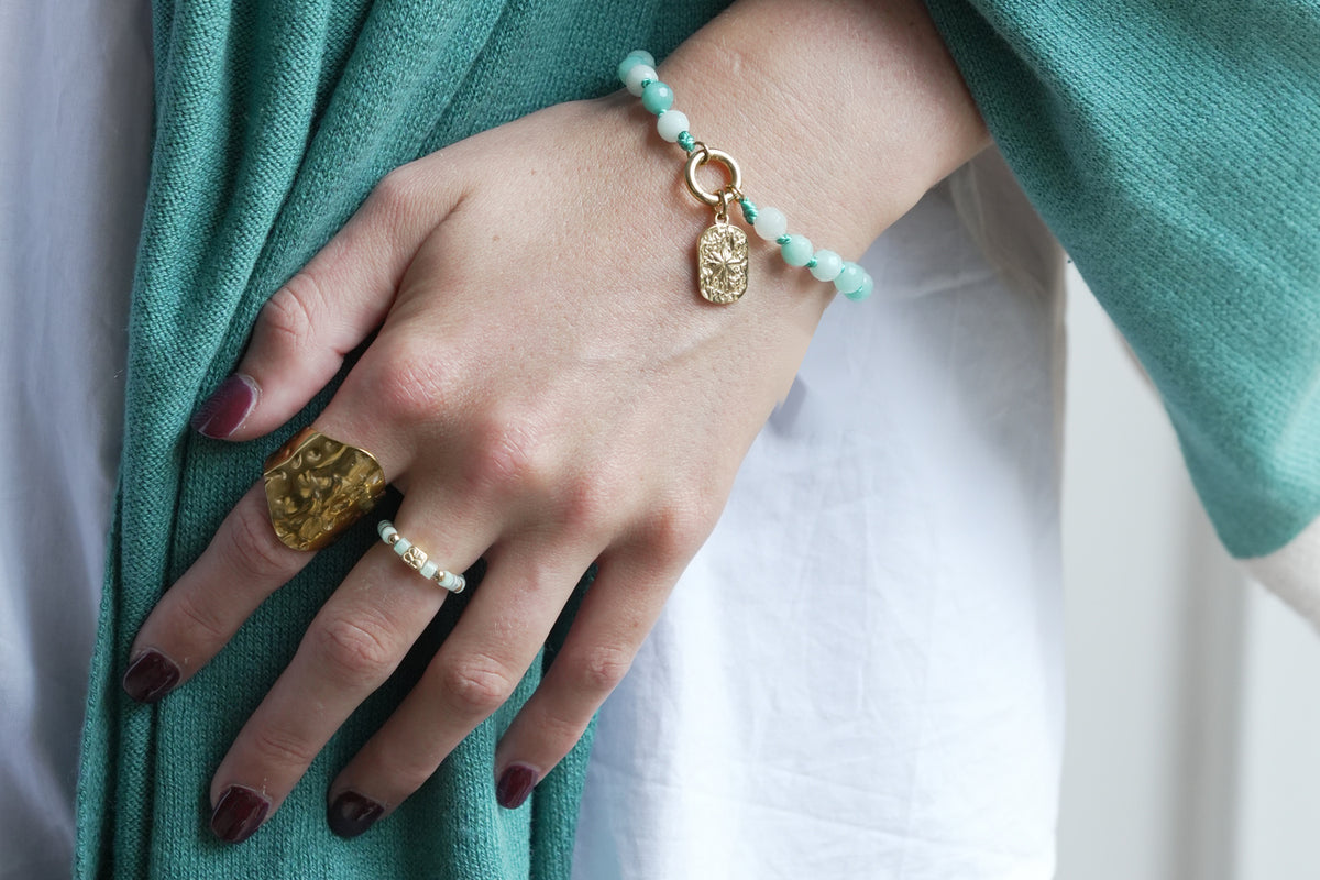 Mala amazonite gold ring by Boho Betty – styled with other jewellery, a gold amazonite beaded stretch ring