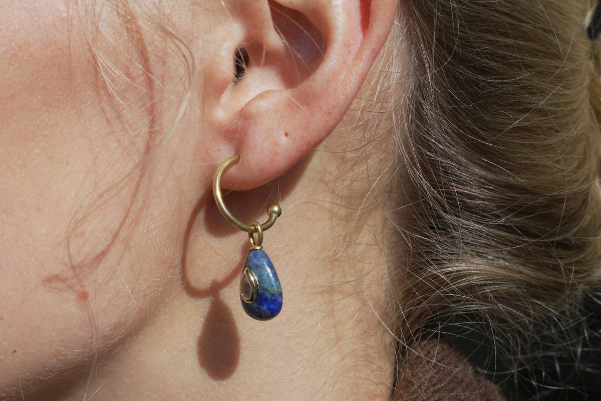Hana lapis lazuli and gold hoop earrings by Boho Betty – worn on the ear, gold lapis lazuli gemstone drop hoop earrings