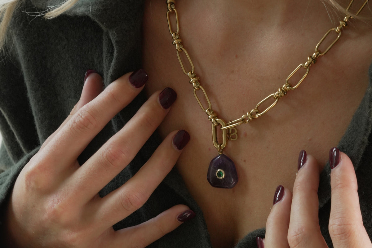 Helia oval chain and Kalis amethyst necklace by Boho Betty – a gold amethyst gemstone charm pendant on an oval chain necklace