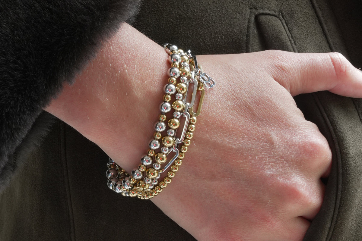Gemma silver mixed metal bead bracelet by Boho Betty – styled in a stack, a stackable mixed metal beaded stretch bracelet