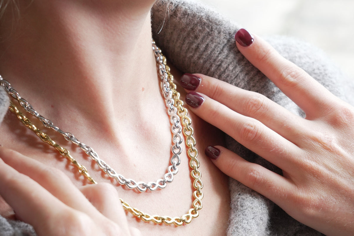 Hachi silver infinity link necklace by Boho Betty – styled with other jewellery, a silver infinity link layering necklace