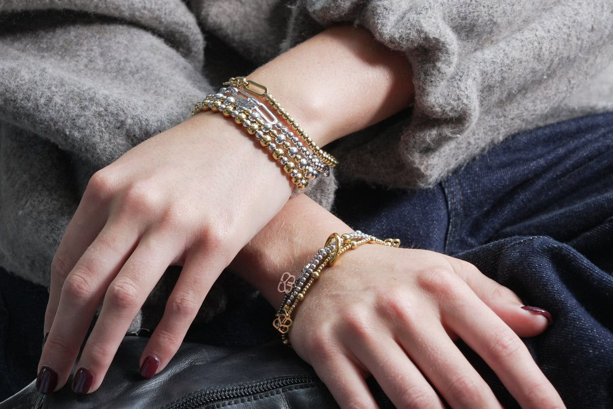 Mora gold stretch bracelet by Boho Betty – styled in a stack, a stackable gold beaded stretch bracelet for everyday wear