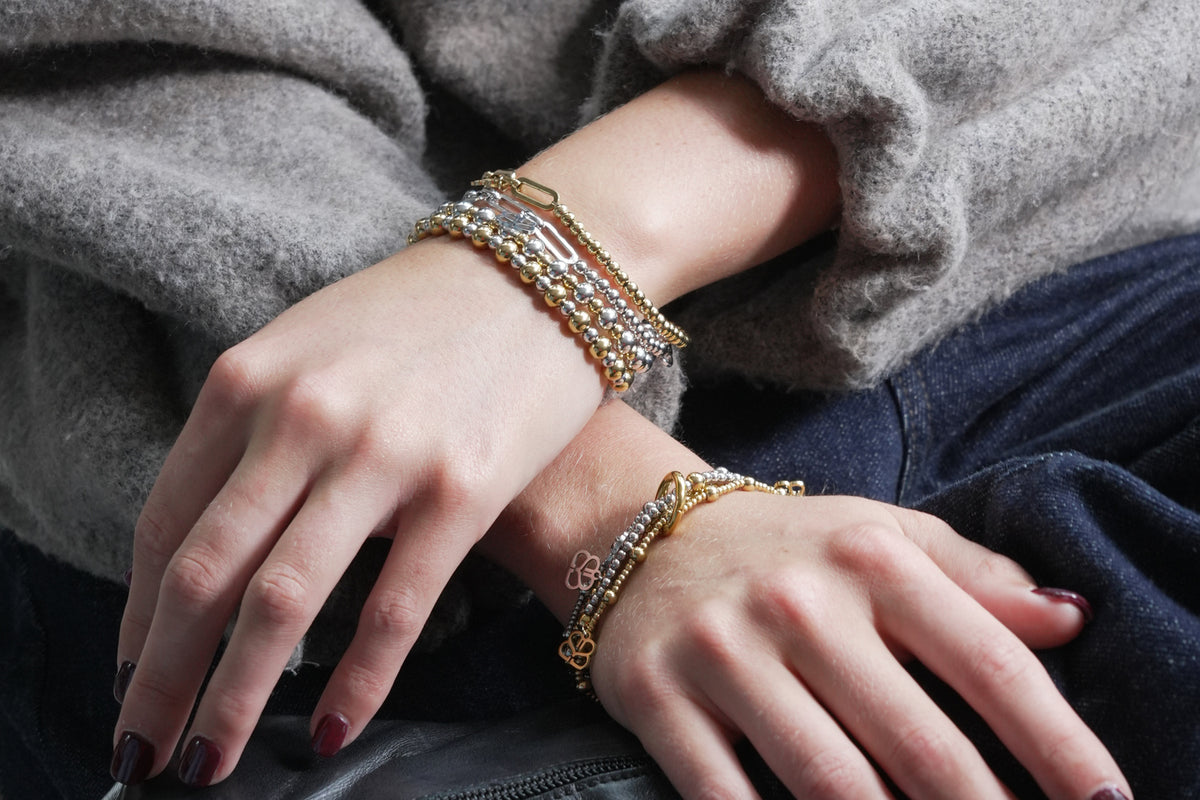 Mora silver stretch bracelet by Boho Betty – styled in a stack, a stackable silver beaded stretch bracelet for everyday wear