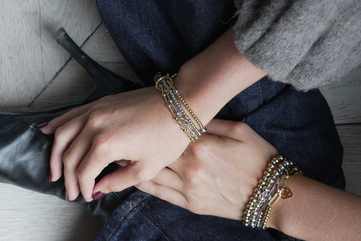 Rosa gold stretch bracelet by Boho Betty – styled in a stack, a stackable gold beaded stretch bracelet for everyday wear