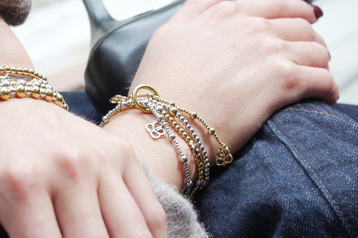 Rosa silver stretch bracelet by Boho Betty – styled in a stack, a stackable silver beaded stretch bracelet for everyday wear