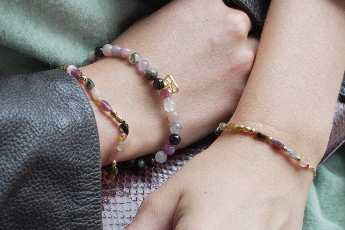 Charlene gold tourmaline gemstone bracelet by Boho Betty – styled in a stack, a gold tourmaline beaded stretch bracelet