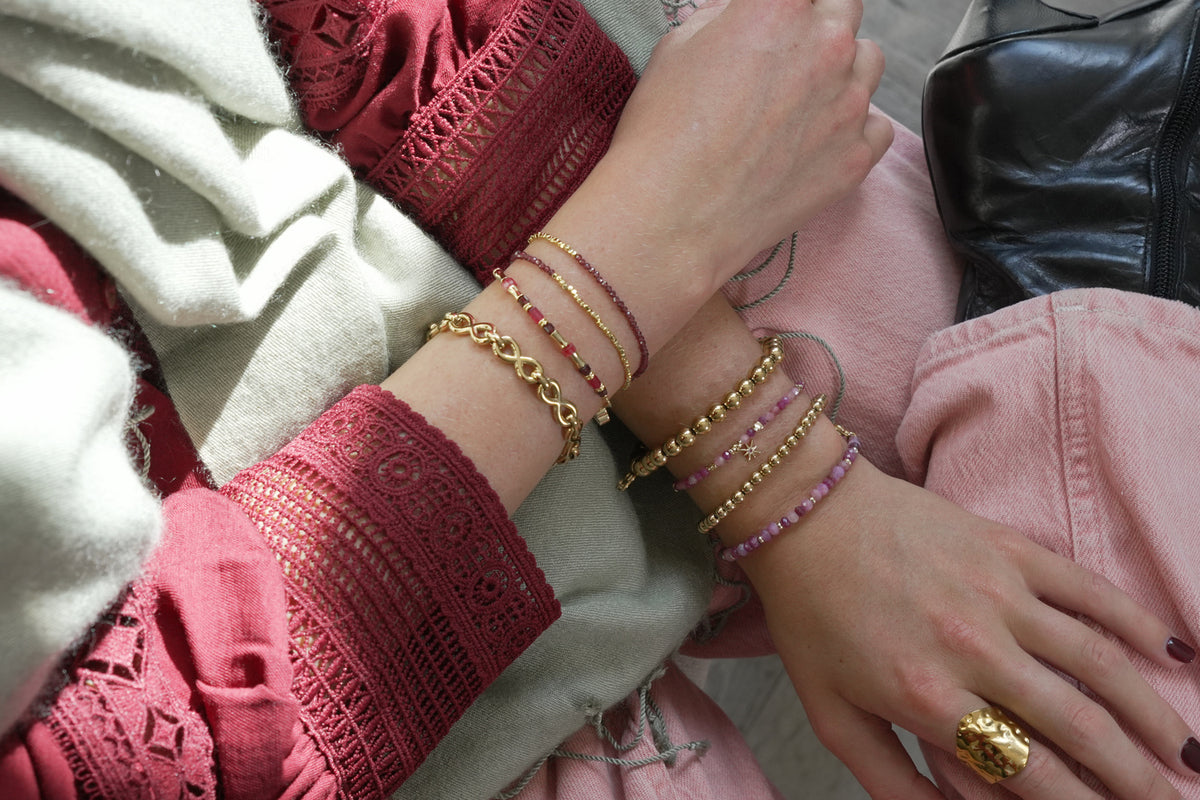 Octavia gold infinity link bracelet by Boho Betty – styled in a stack, a stackable gold infinity link bracelet