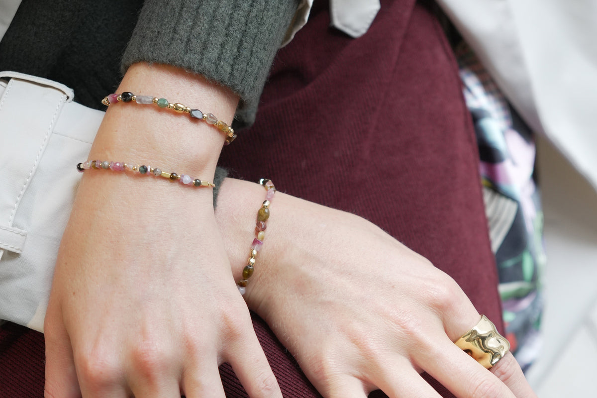 Rochelle gold tourmaline bead bracelet by Boho Betty – styled in a stack, a gold tourmaline gemstone beaded slider bracelet
