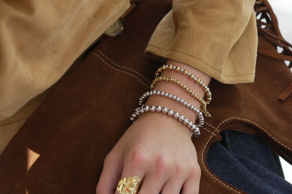 Cleo silver bead stretch bracelet by Boho Betty – styled in a stack, a stackable silver beaded stretch bracelet