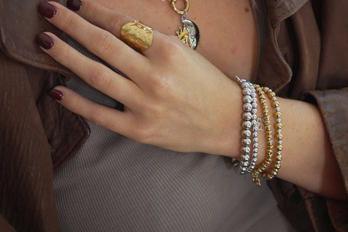 Lissette silver bead bracelet by Boho Betty – styled in a stack, a stackable silver beaded stretch bracelet for everyday wear