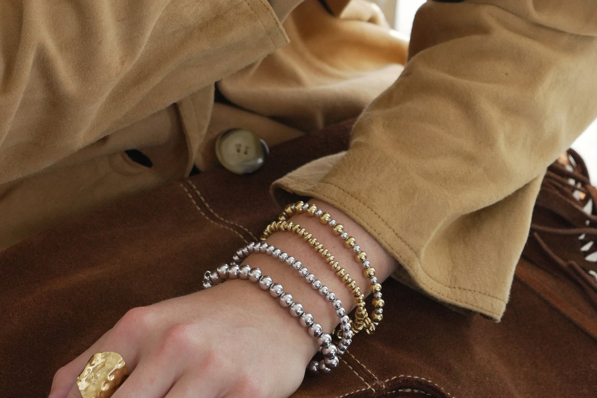 Lissette silver bead bracelet by Boho Betty – styled in a stack, a stackable silver beaded stretch bracelet for everyday wear