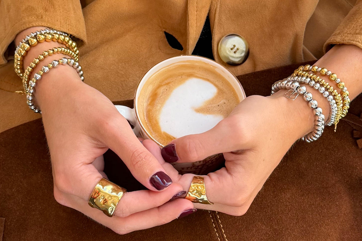 Lissette gold bead bracelet by Boho Betty – styled in a stack, a stackable gold beaded stretch bracelet for everyday wear
