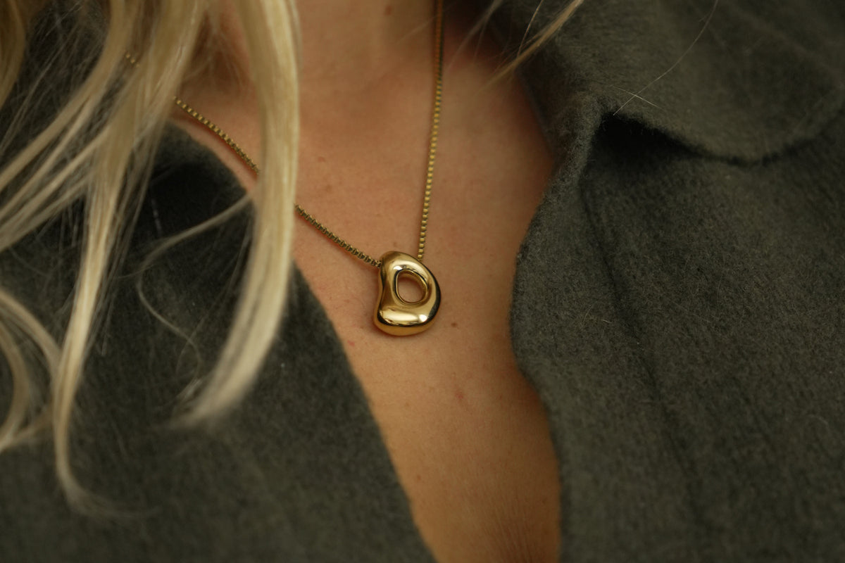 Sola waterproof gold initial letter D necklace by Boho Betty – a gold bubble letter D initial necklace on a fine box chain