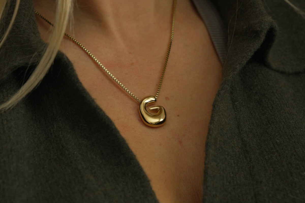 Sola waterproof gold initial letter G necklace by Boho Betty – a gold bubble letter G initial necklace on a fine box chain