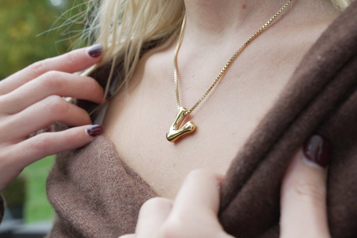 Sola waterproof gold initial letter V necklace by Boho Betty – a personalised gold initial V pendant on a box chain