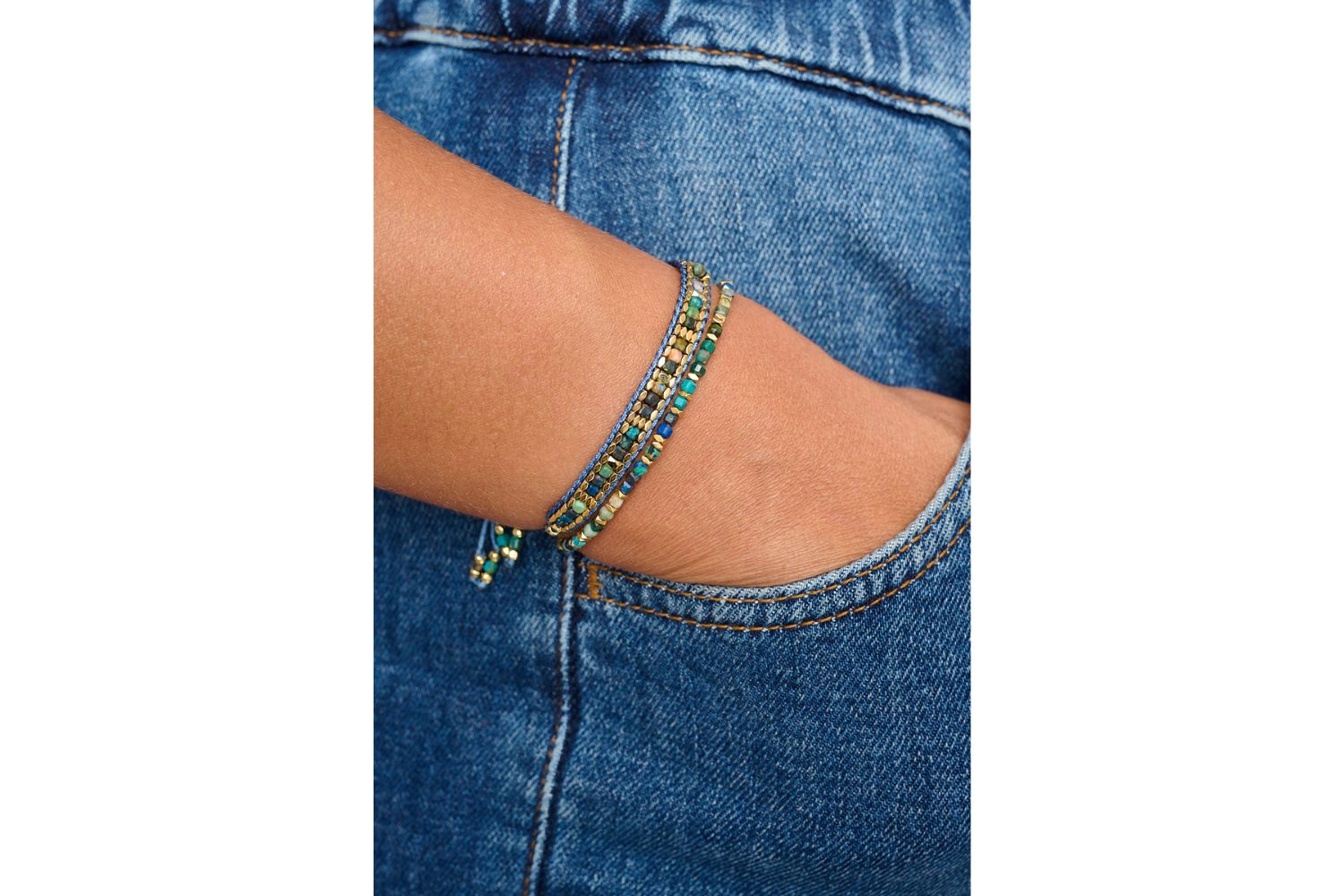 Valentina Gold Azurite Gemstone Slider Bracelet styled on the wrist, showcasing natural azurite gemstone beads with warm gold-plated accents—perfect for layering or wearing solo.