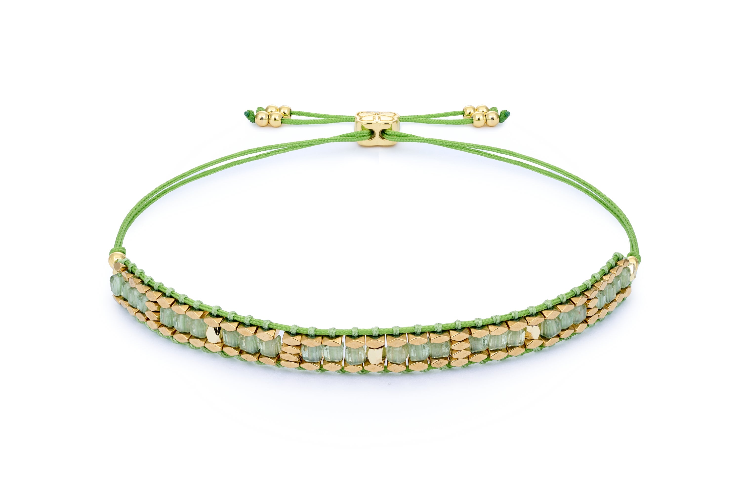 Anastasia Gold & Green Apatite Friendship Bracelet featuring lush green apatite beads, shimmering 12k gold-plated accents, and an adjustable slider fastening for a comfortable, custom fit.