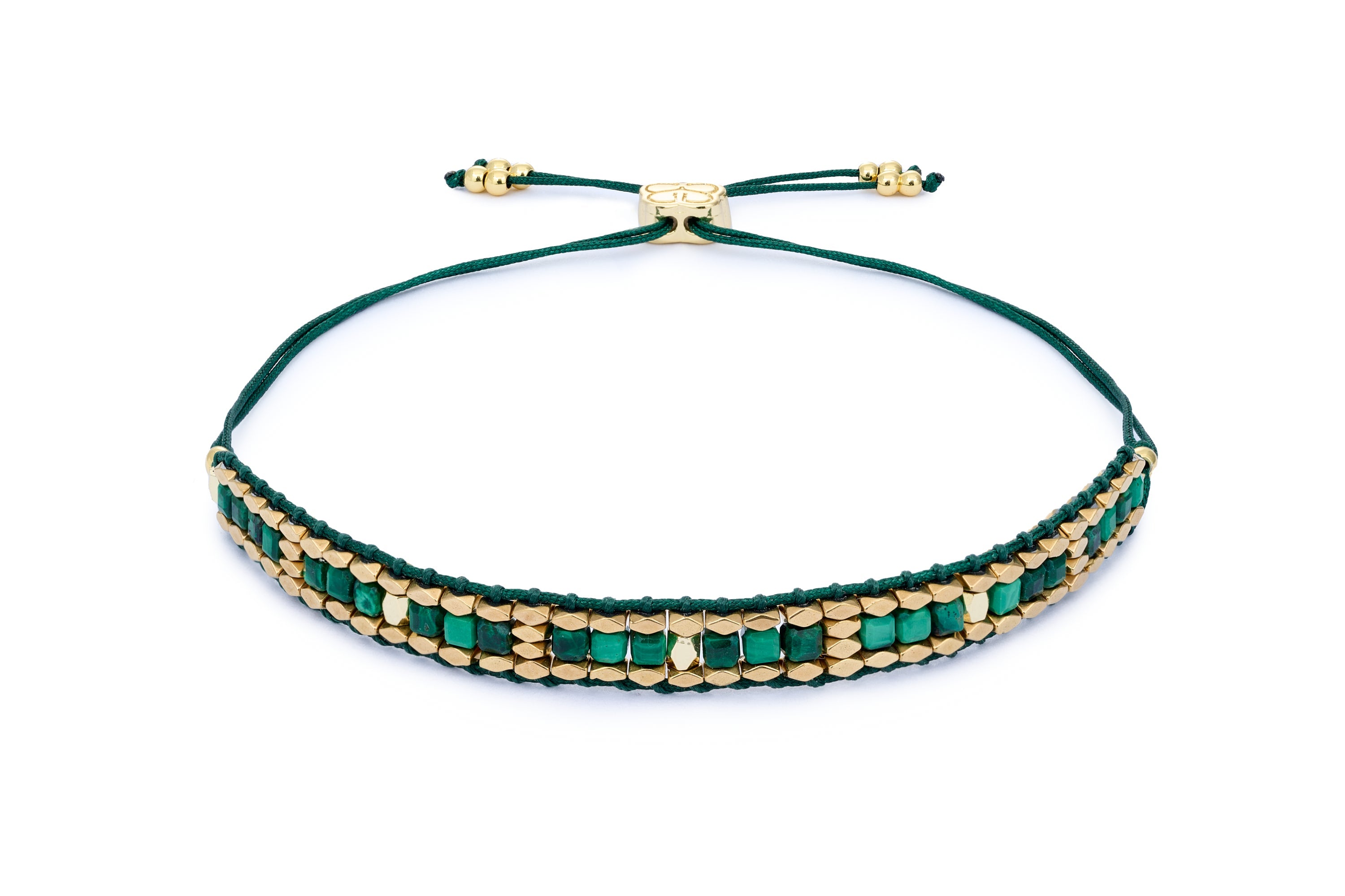 Anastasia Malachite & Gold Friendship Bracelet featuring deep green malachite beads, 12k gold-plated faceted accents, and an adjustable pull-tie slider for a custom fit and effortless layering.
