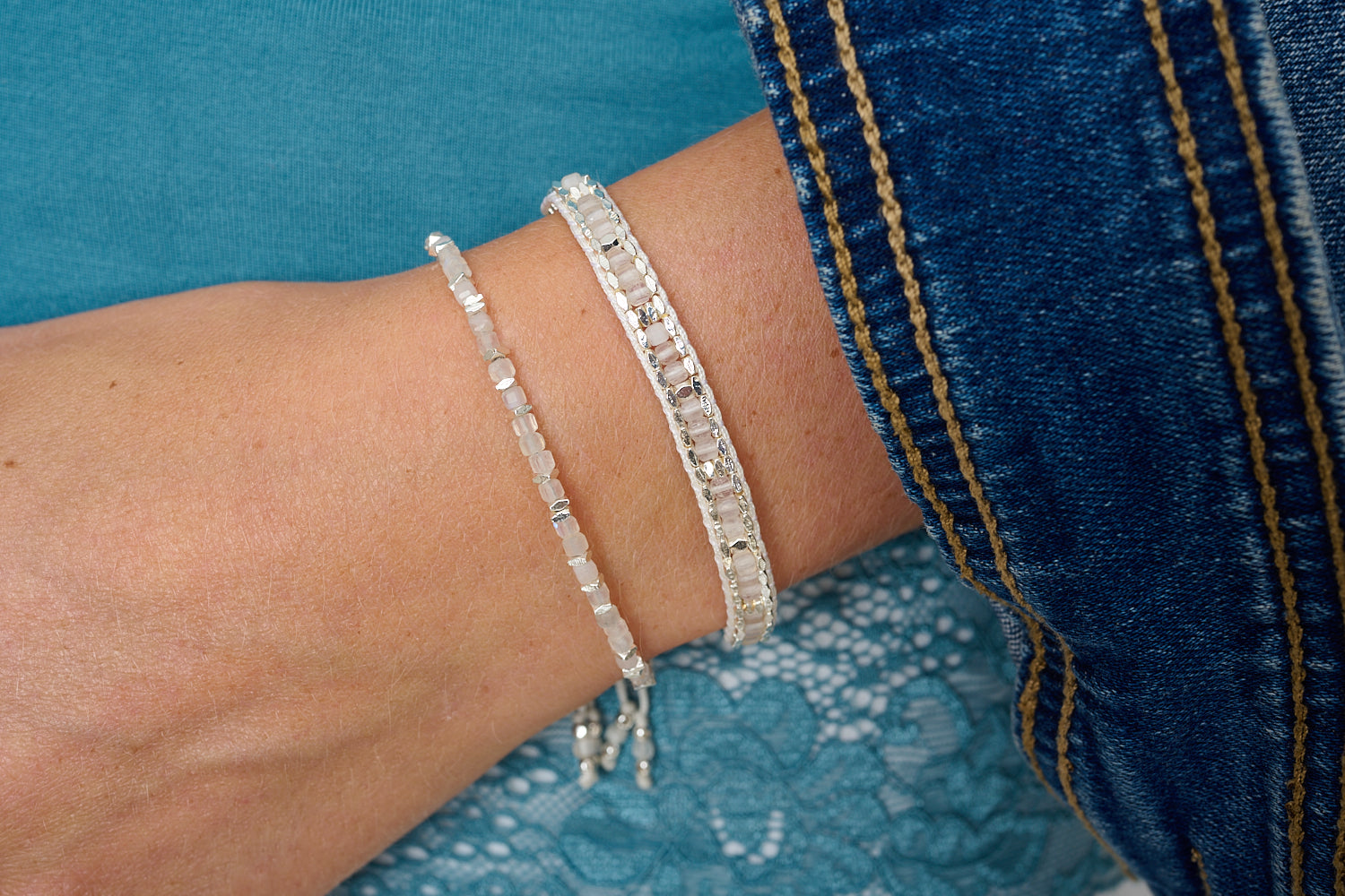 Anastasia Silver & Rainbow Moonstone Bracelet styled on the wrist, showcasing iridescent moonstone beads with sterling silver accents—perfect for layering or wearing solo.