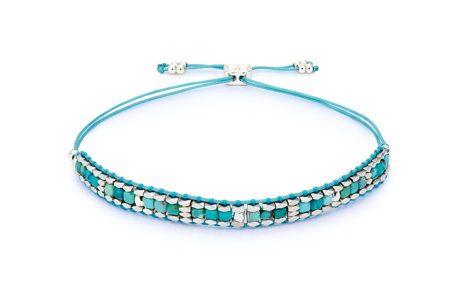 Anastasia Turquoise Howlite & Silver Bracelet featuring vibrant turquoise gemstones, silver-plated faceted beads, and an adjustable woven slider fastening for the perfect fit.