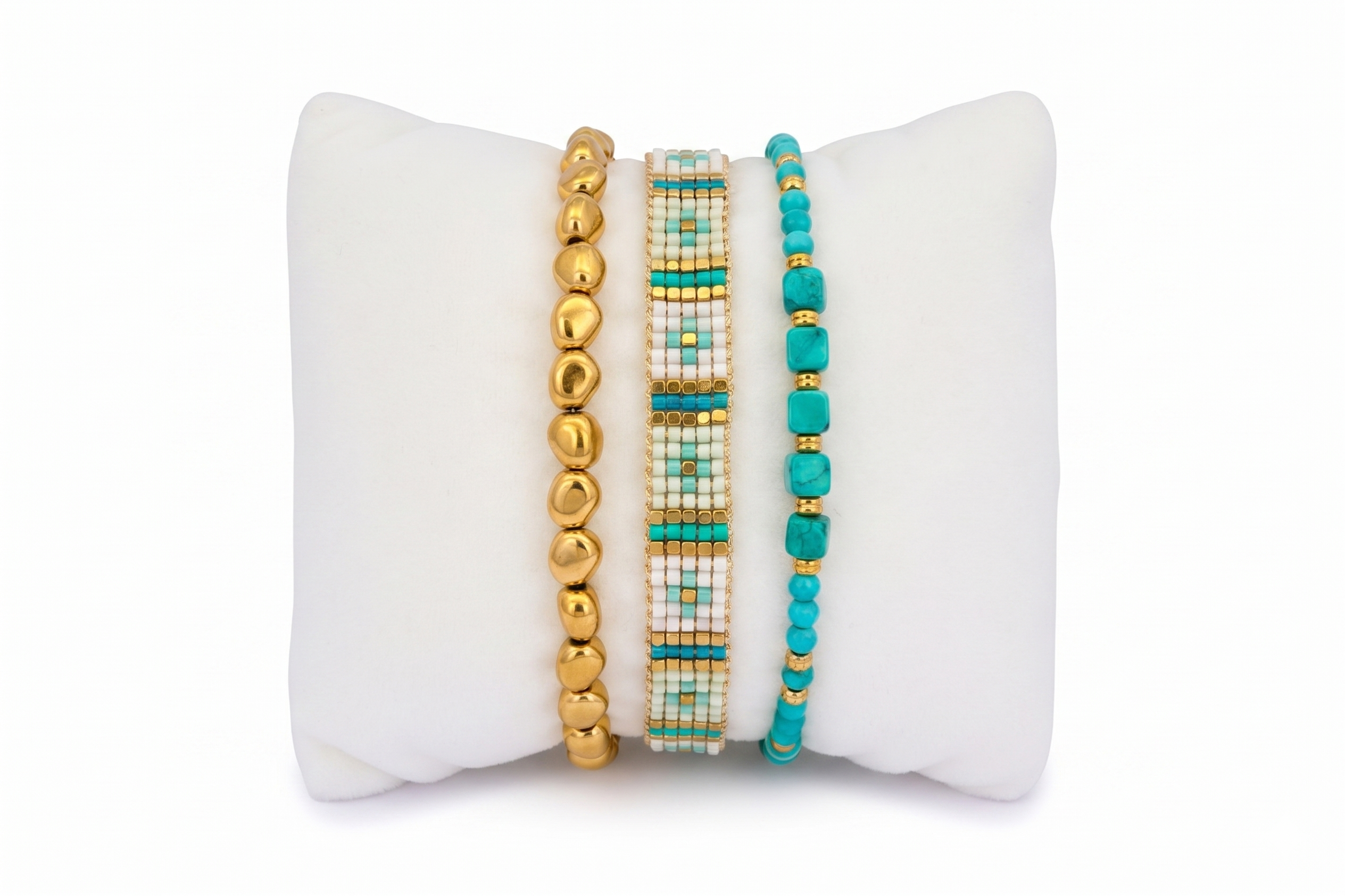 Antigua Turquoise and Gold Bracelet Stack featuring layered turquoise gemstone bracelets, gold bead details and woven Miyuki bead textures in a bright boho-inspired design.