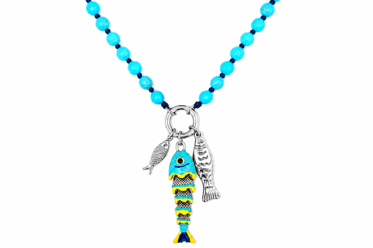 Ariel Turquoise Howlite Silver Waterproof Fish Charm Necklace featuring faceted Turquoise Howlite gemstones, three removable fish charms and White Gold PVD-coated stainless steel details.