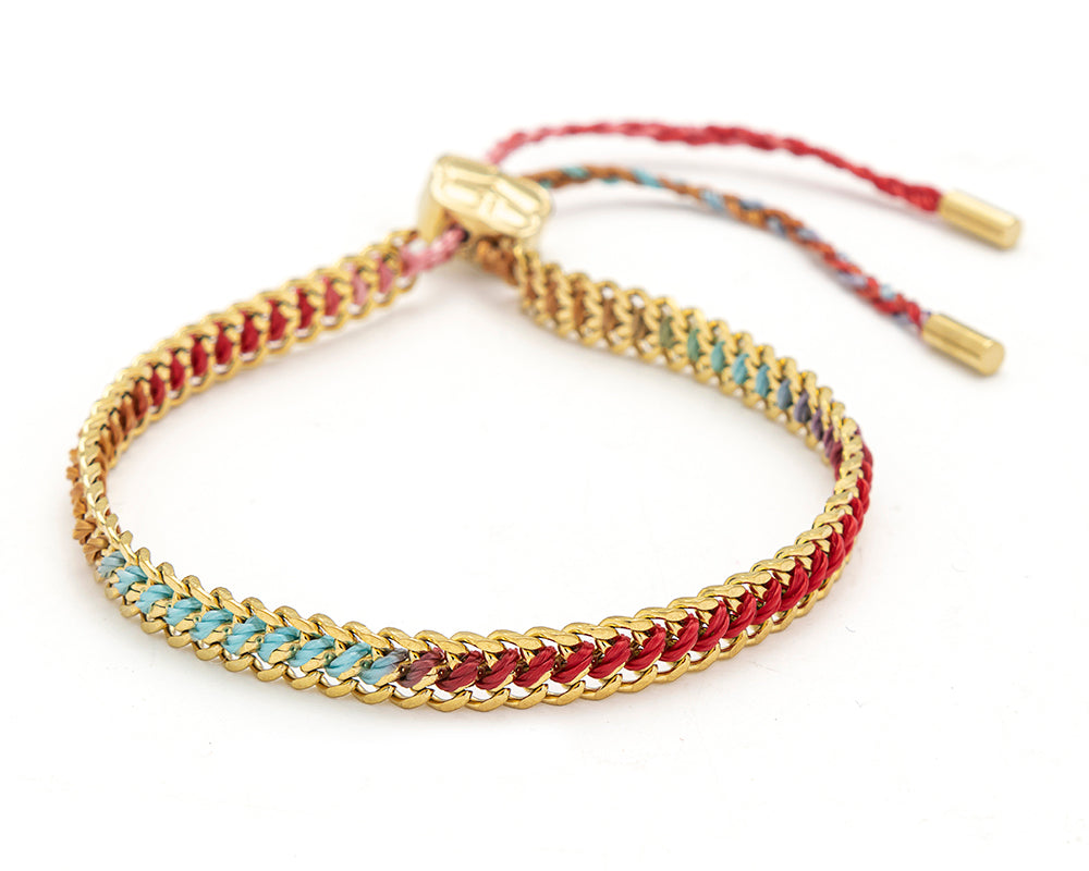 Athena Moroccan Spice Gold Braided Bracelet featuring vibrant jewel-toned woven threads braided through a waterproof gold PVD stainless steel chain with adjustable slider fastening.