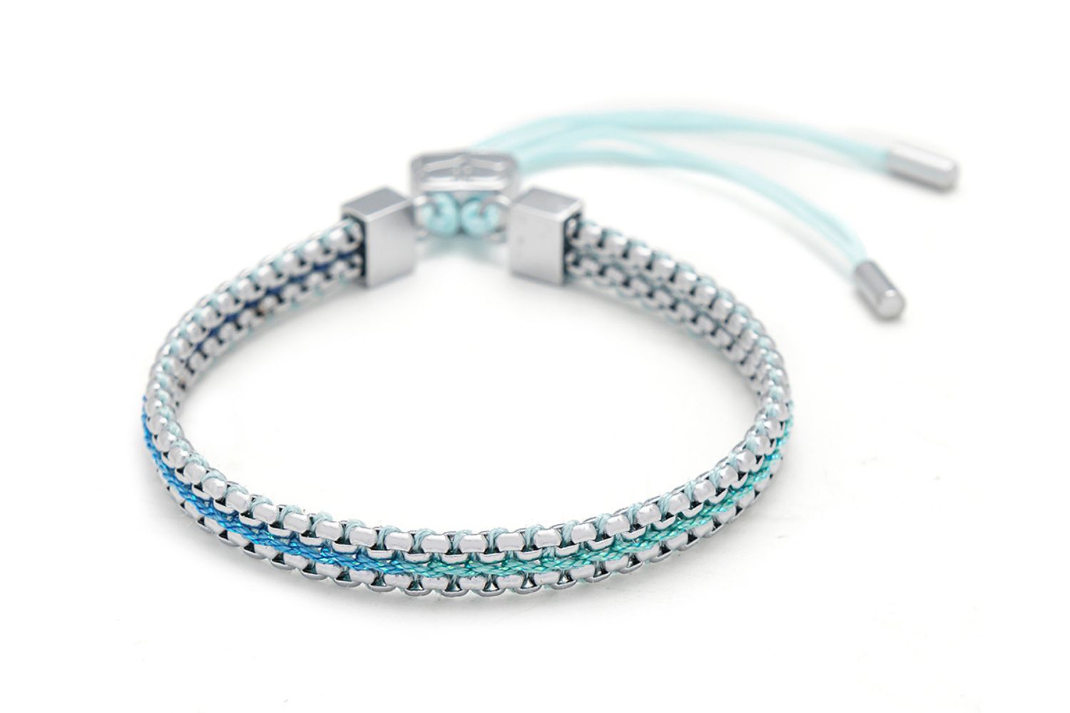 Bloom sky blue braided friendship bracelet with soft blue threads and silver chain detailing with adjustable slider fastening.