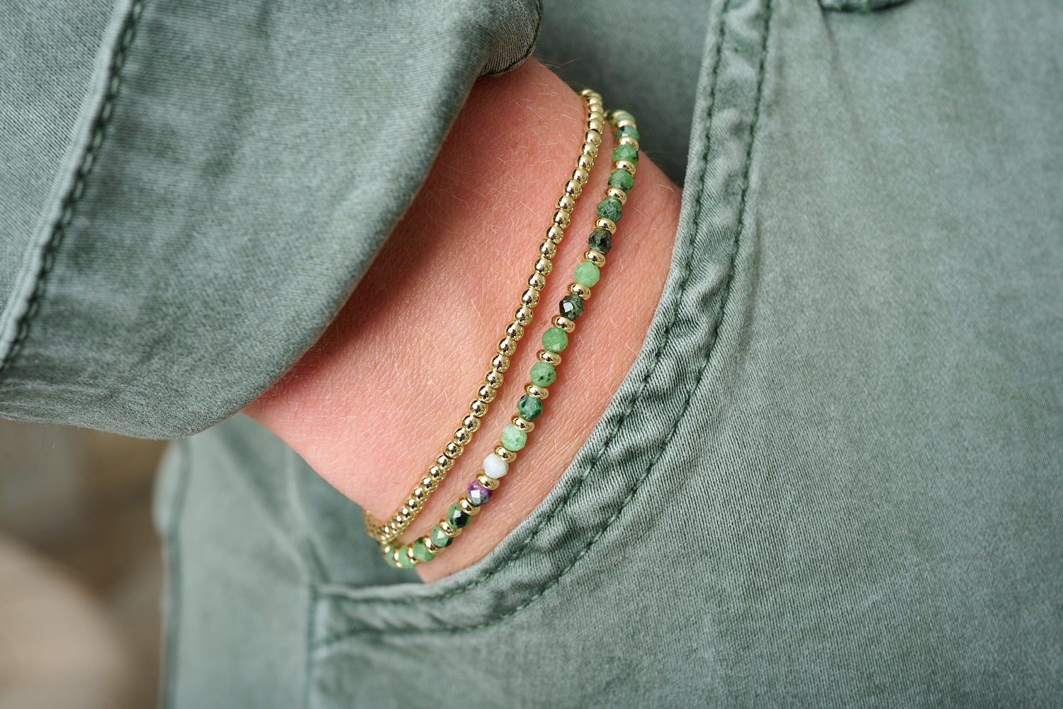 Bluebell Gold & Ruby Zoisite Bracelet styled with other Boho Betty bracelets on the wrist, radiating layered, earthy charm with bold natural tones.