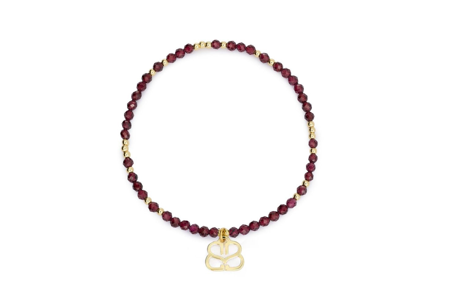 Cassia Gold & Garnet Stretch Gemstone Bracelet featuring faceted red garnet stones, gold-plated beads, and Boho Betty signature charm.