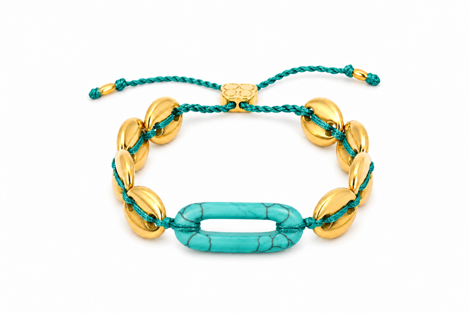 Corozo Turquoise Howlite Gold Waterproof Slider Bracelet featuring an elongated Turquoise Howlite centrepiece, polished gold beads, teal thread and waterproof 14k Gold PVD stainless steel details.