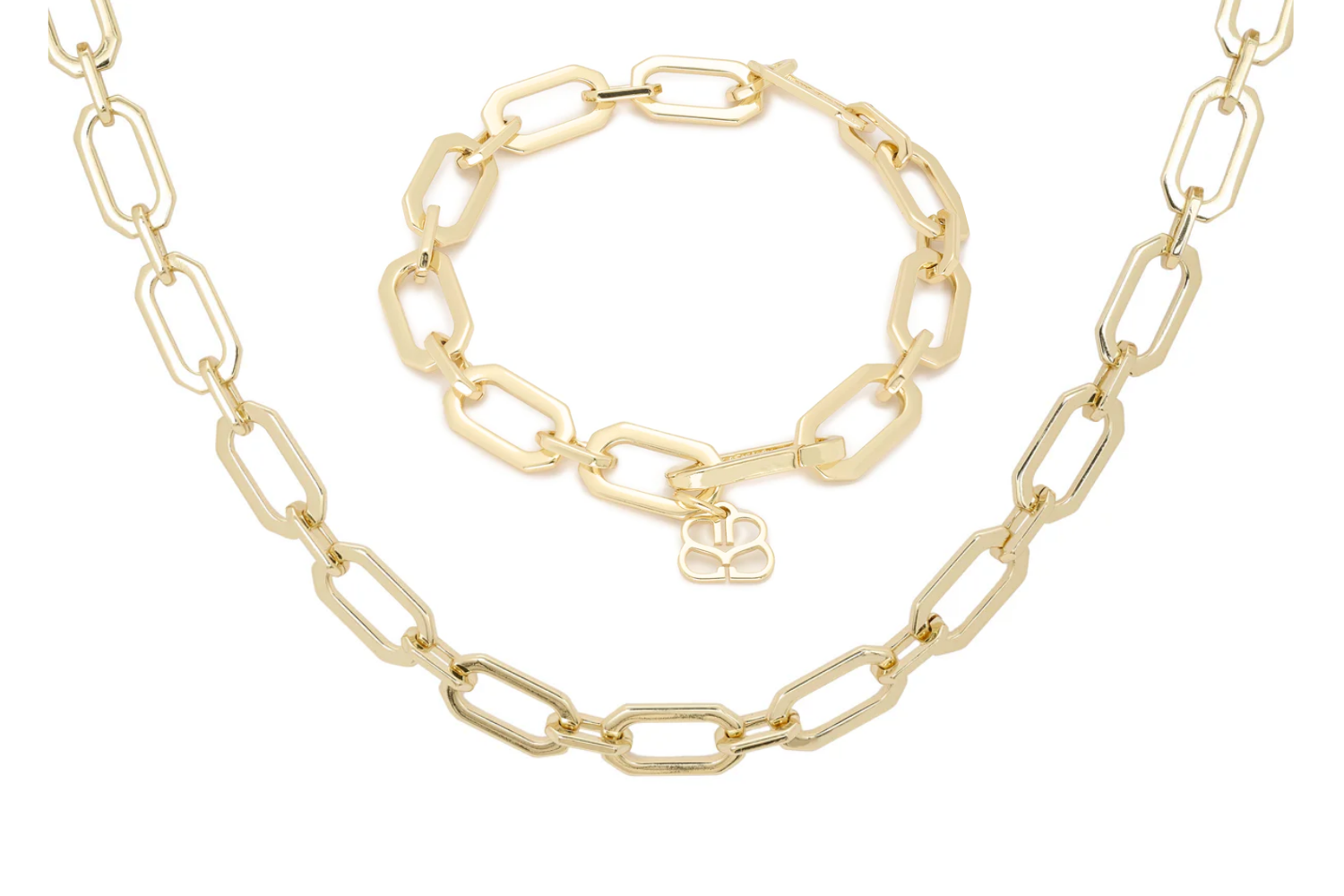 Crisos Gold Necklace and Bracelet Set featuring bold 12k gold-plated chunky chains, designed for a modern and sophisticated statement look.