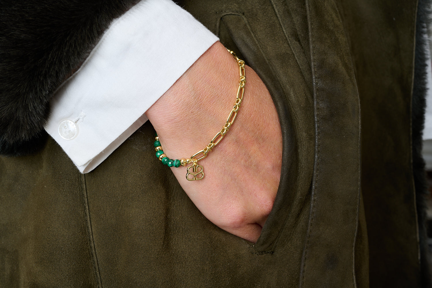 Dahlia Malachite Gold Bracelet styled in a boho bracelet stack