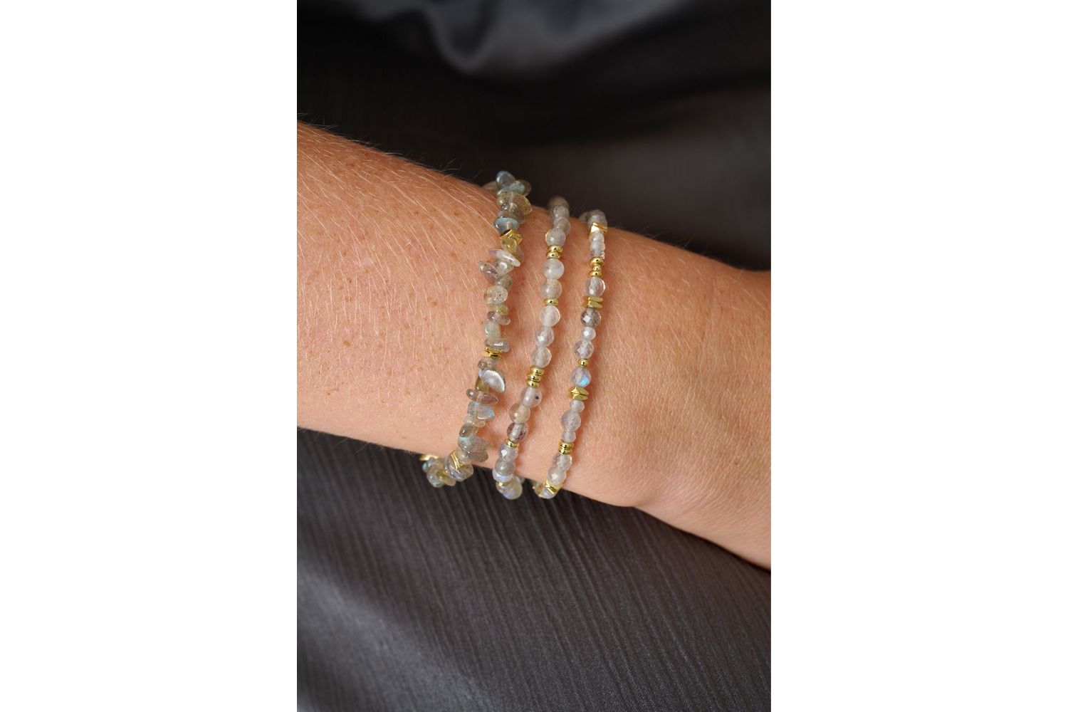 Dominica Labradorite & Gold Bracelet Stack styled with layered boho jewellery, perfect for everyday wear or meaningful gifting.