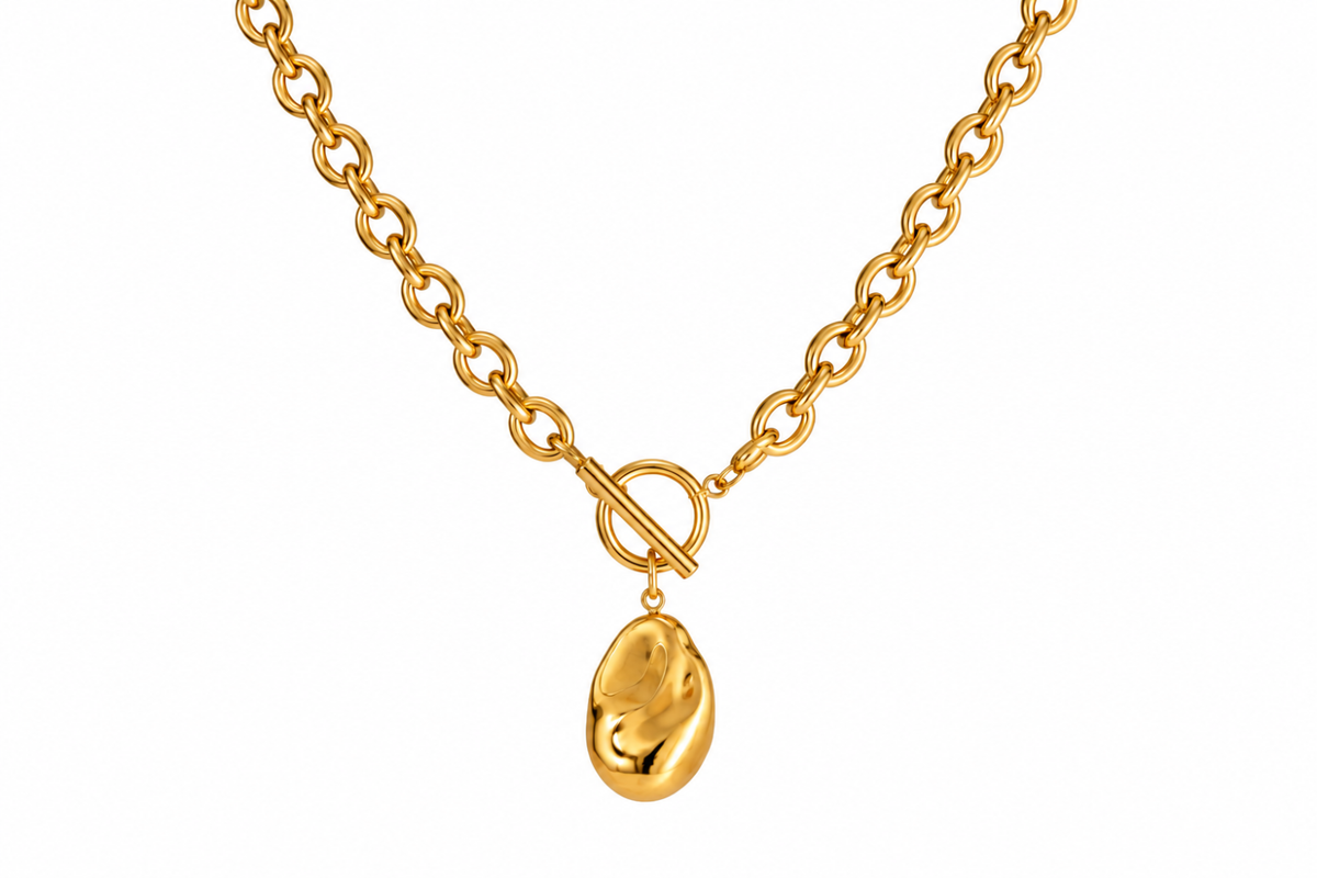 Bindu Gold Nugget Pendant T-Bar Chain Necklace featuring chunky gold links, a sculptural organic nugget pendant and statement T-bar fastening in waterproof 14k Gold PVD stainless steel.