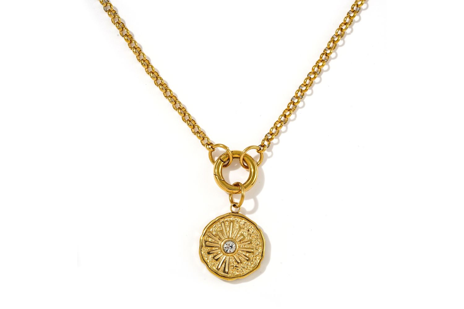 Eira reversible gold pendant necklace with sun and moon design and CZ crystal detail.