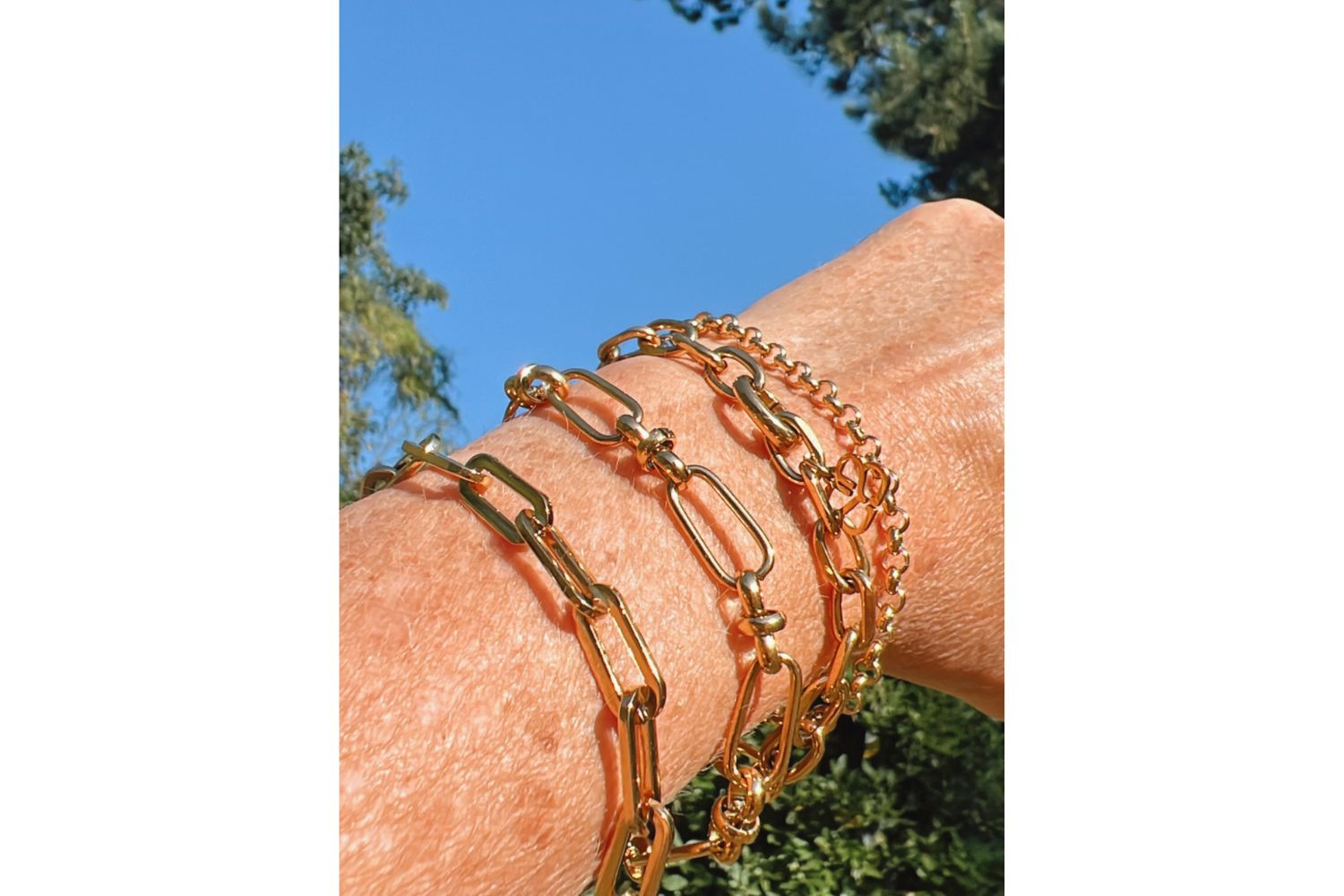 Eleni bracelet styled on the wrist for a sculptural statement, ideal for beach-to-dinner styling.