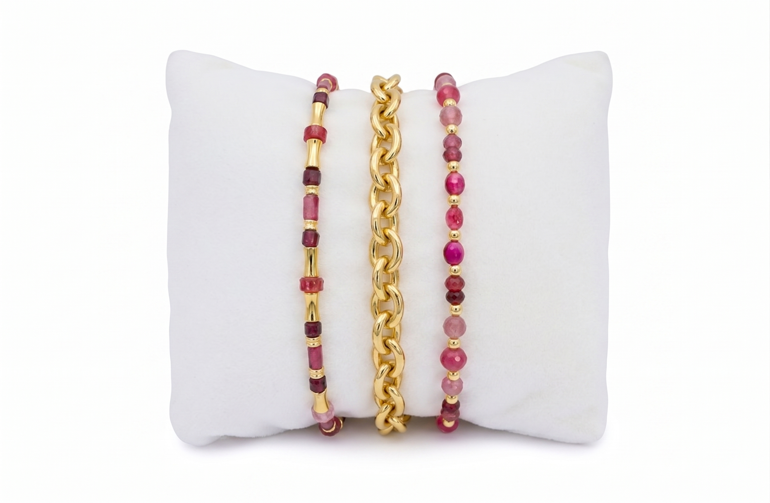 Granito Garnet & Gold Stacking Bracelets, garnet beads, chunky gold chain and pink tourmaline strand layered together.